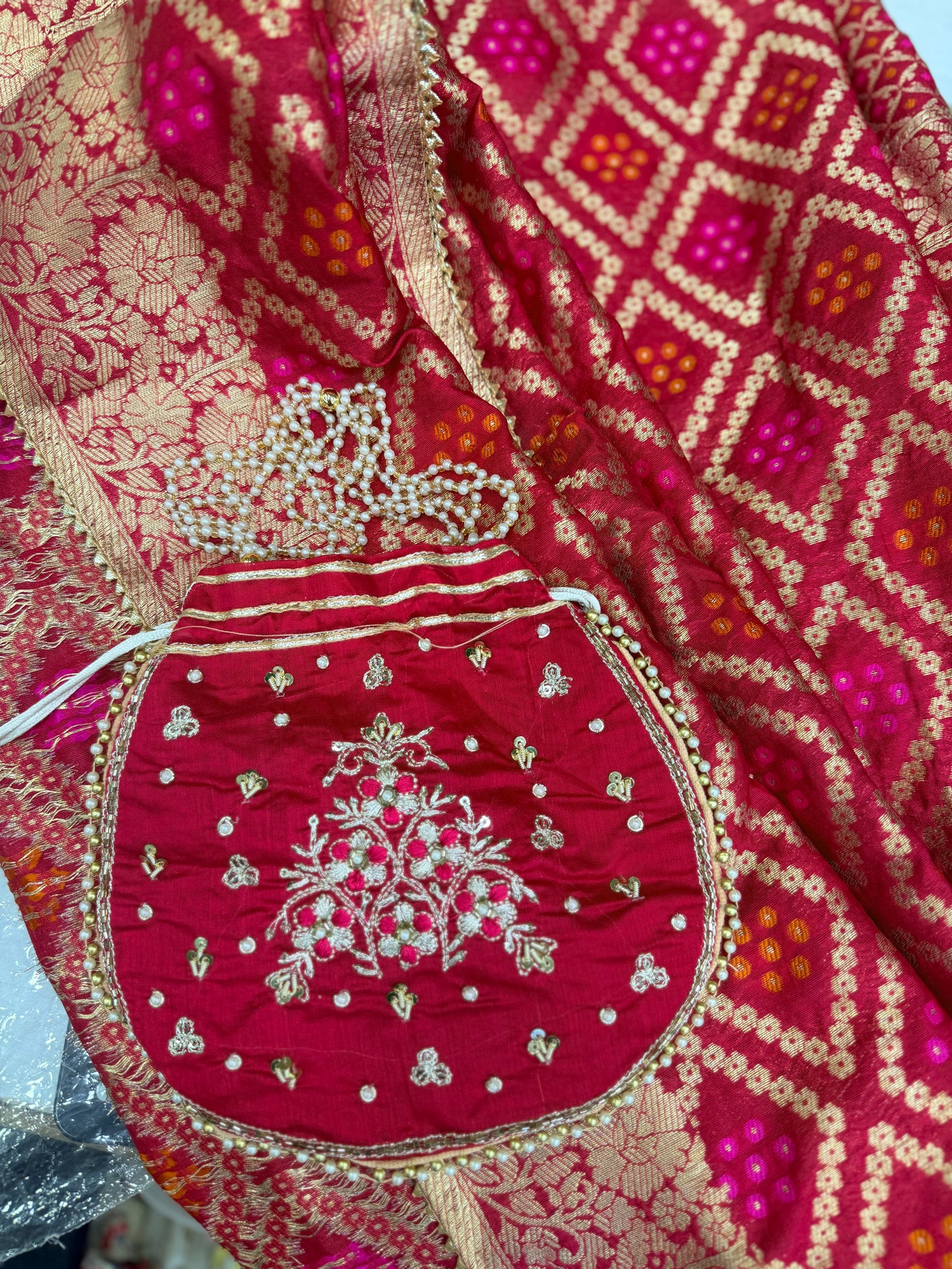 Pure Banarasi Silk Red Suit Set with Matching Potli Bag